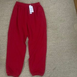 red sweatpants, brand new with tags, size XL